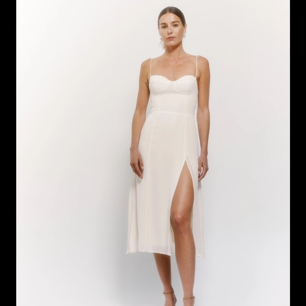 Never worn new with tags Reformation Dress. Size 8.